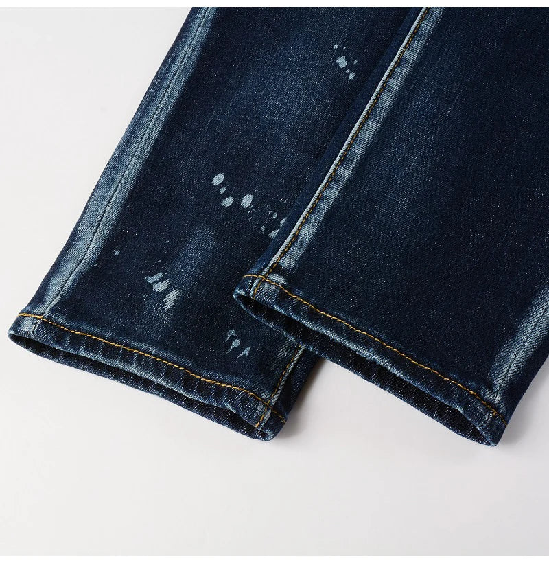 Detail of lower leg on Nofacebaby M13 jeans, highlighting distressed hems