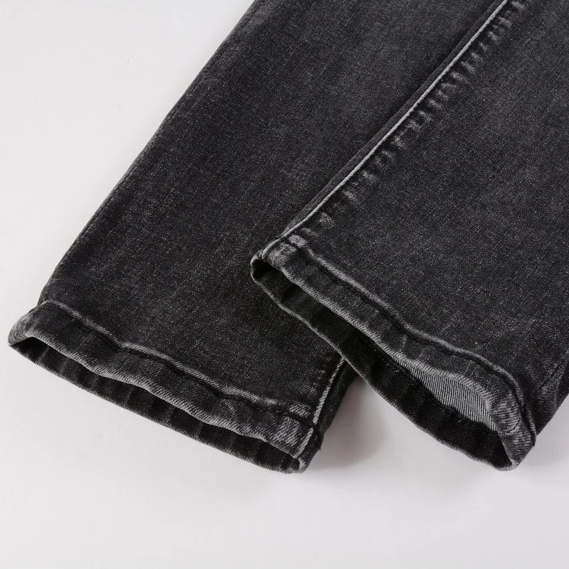 Close-up of the leg hem on Nofacebaby Gray Skinny Jeans, showing the quality denim finish.