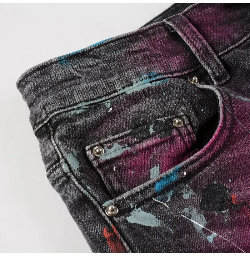 Front pocket and waistband of Nofacebaby M33 Jeans with paint splashes.