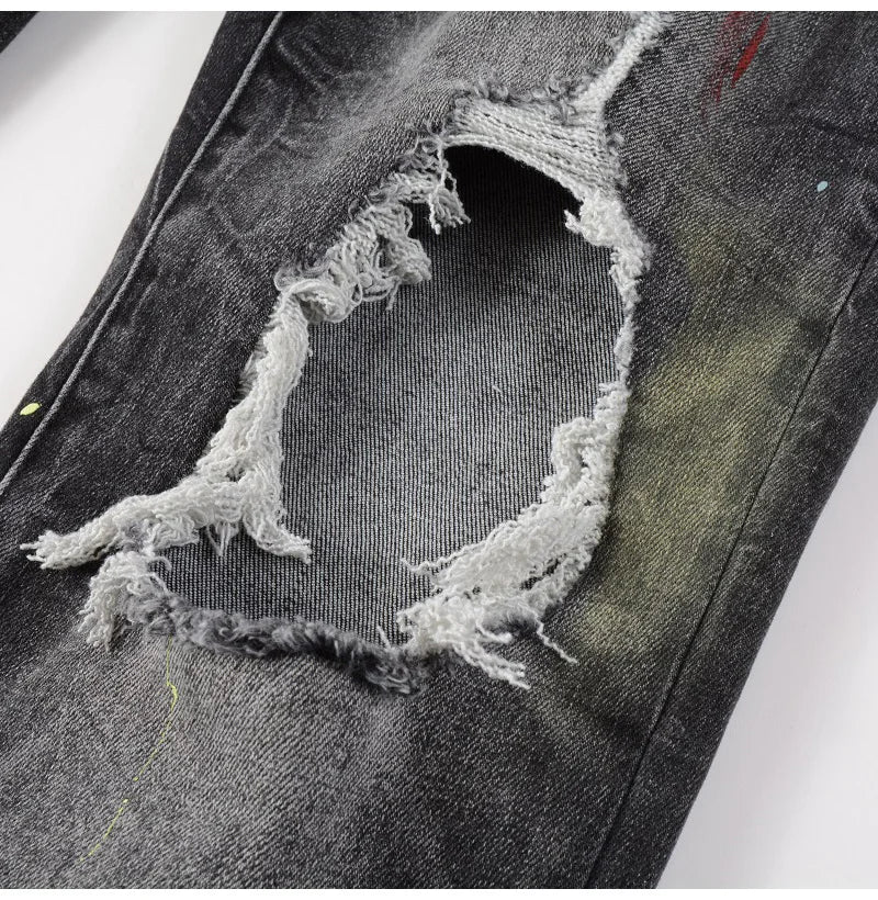 Detailed rip on Nofacebaby M33 Jeans with frayed edges.