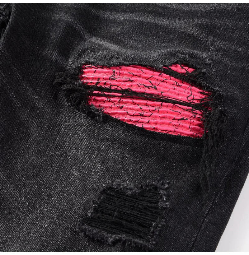 Close-up of the ripped detail on Nofacebaby Rose Skinny Jeans with vibrant pink underlay.