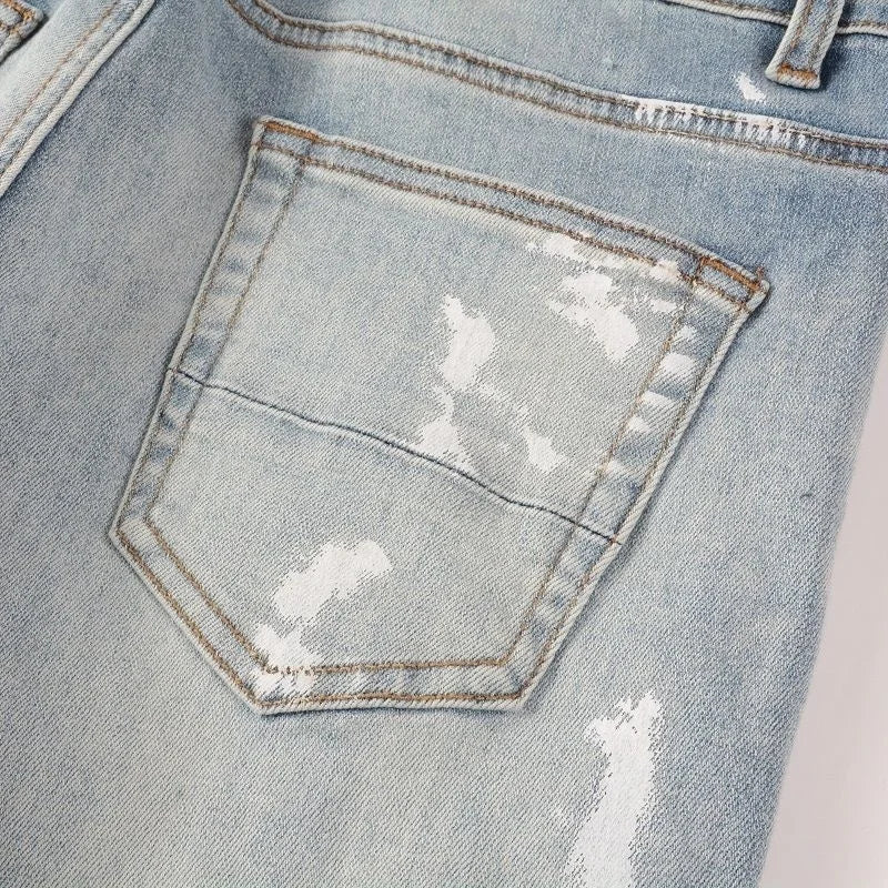 Detailed shot of Nofacebaby Vitto jeans' back pocket with subtle Swarovski crystal accents.