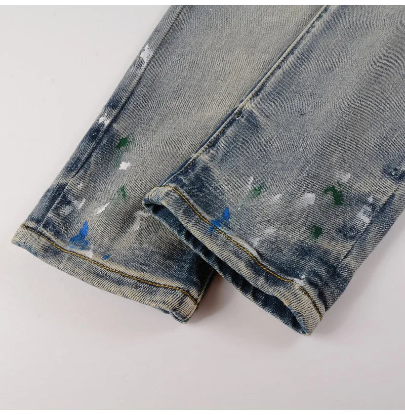 Paint design on the lower leg of Nofacebaby M12 Jeans.