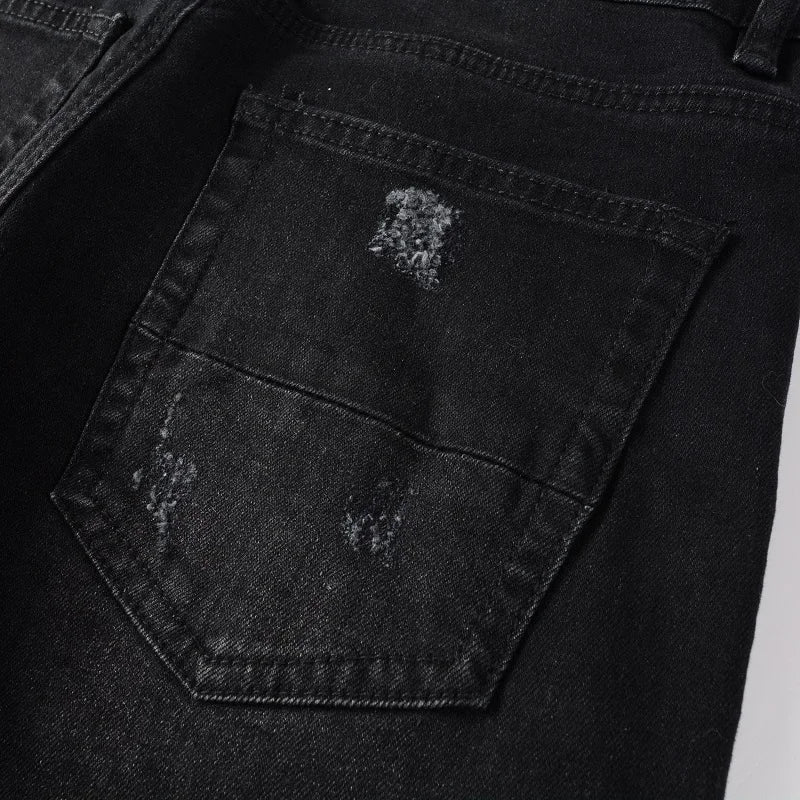 Back pocket design of Nofacebaby M21 black jeans.
